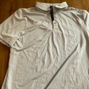 NWT lululemon shirt.   The color is grey/white.   Large.